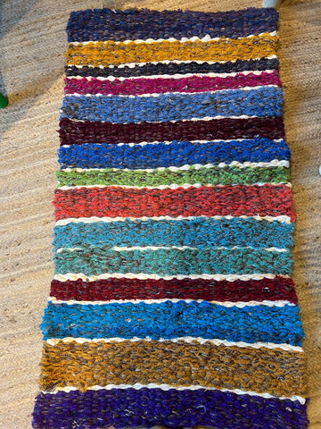 Beginners peg loom woven rag rug