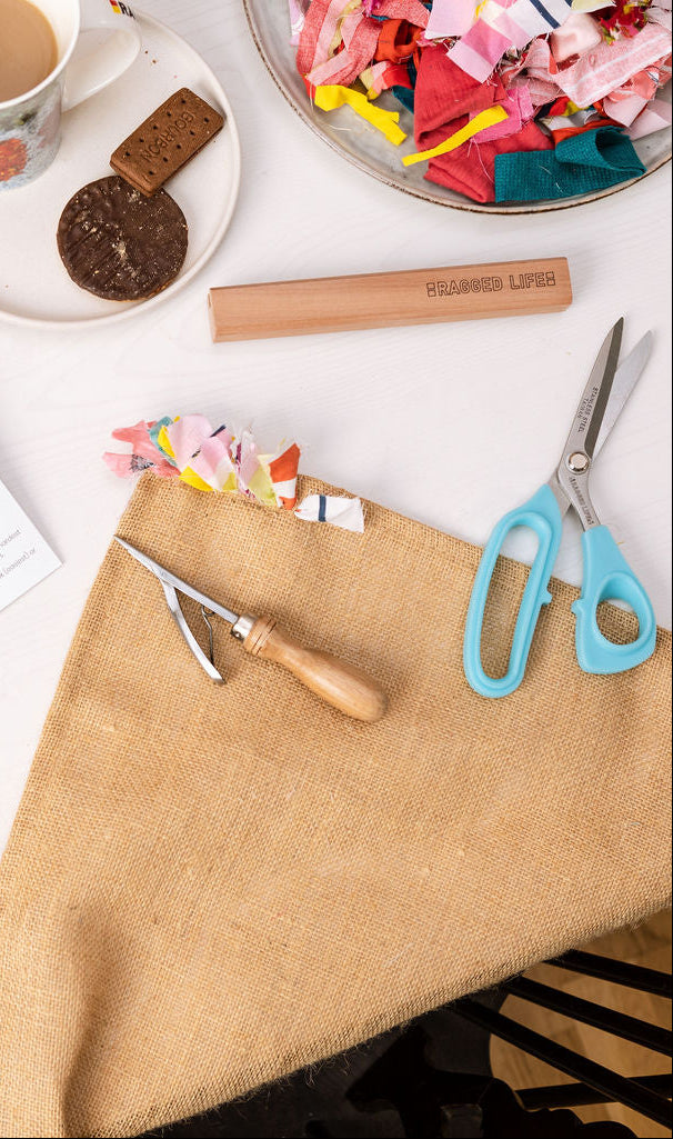 Tools and equipment needed to make a proggy rag rug