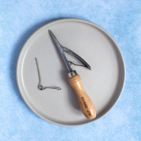 Ragged Life rag rugger tool with spare spring for easy repairs