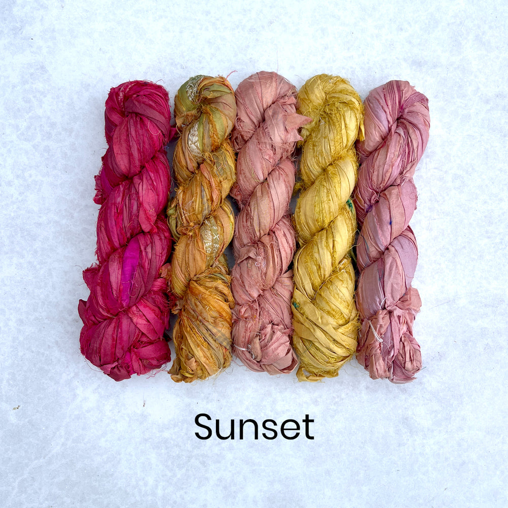 Warm sunset sari silk ribbons shades in red, orange, coral, bright yellow and pink colours