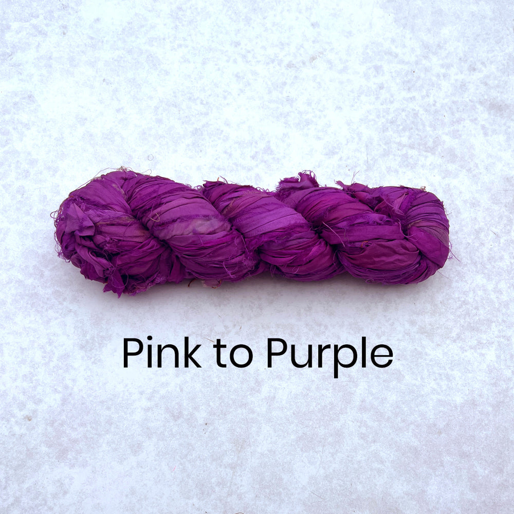 Pink / Purple coloured recycled sari silk ribbon in a twisted braid - 100g skein 