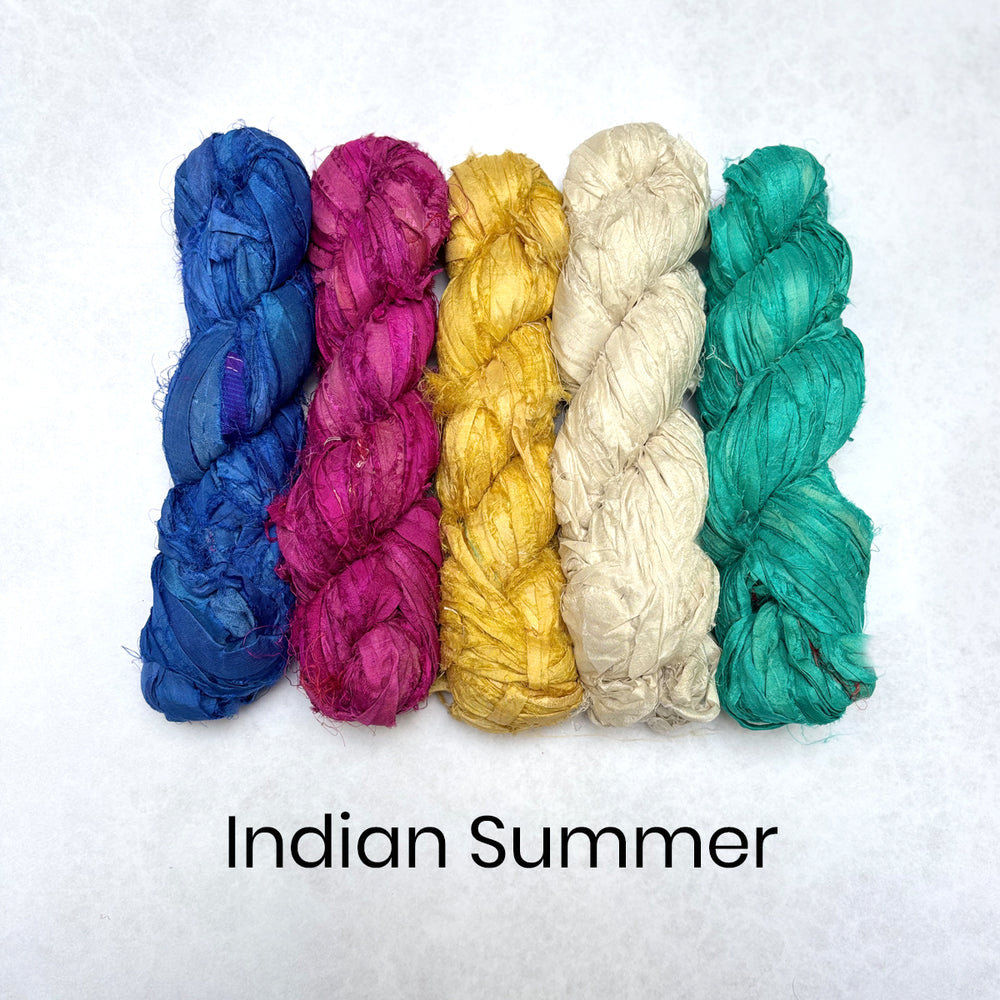 Brightly coloured sari silk ribbon in blue, pink, yellow, white and turquoise 