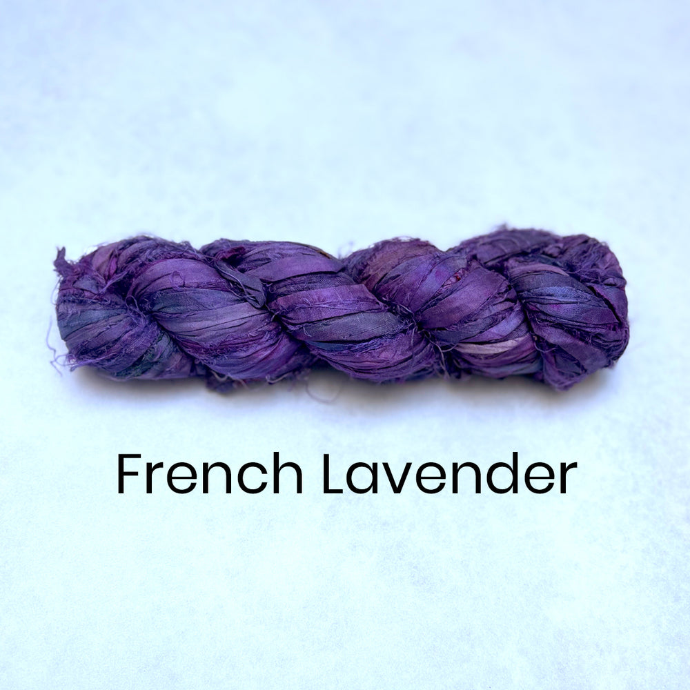 Braided purple yarn on a light blue background with 'French Lavender' text.