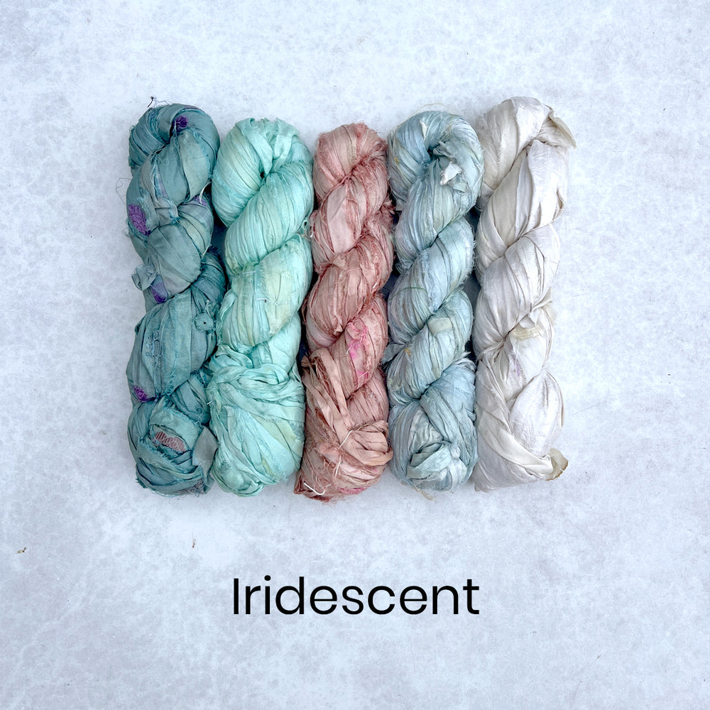 Iridescent pastel coloured sari silk ribbons for fibre crafts and rag rug making fabric