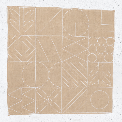 Ragged Life colourful locker hooked rag rug with geometric design on rug canvas