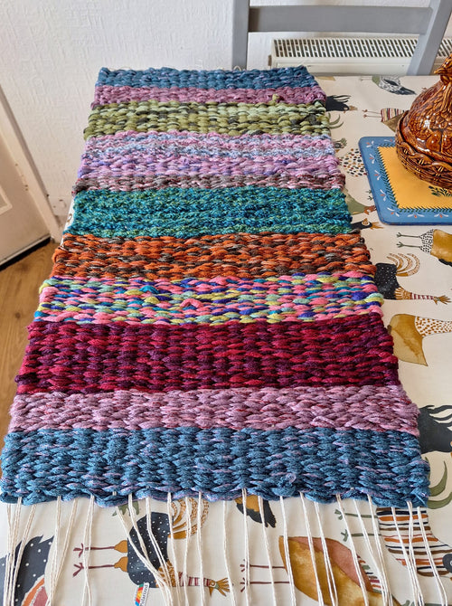 Colourful peg loom woven rug by Mo