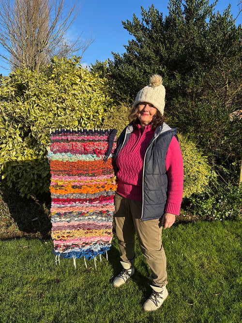 Handmade peg loom weaving on a 50cm peg loom made using fabric scraps and remnants.