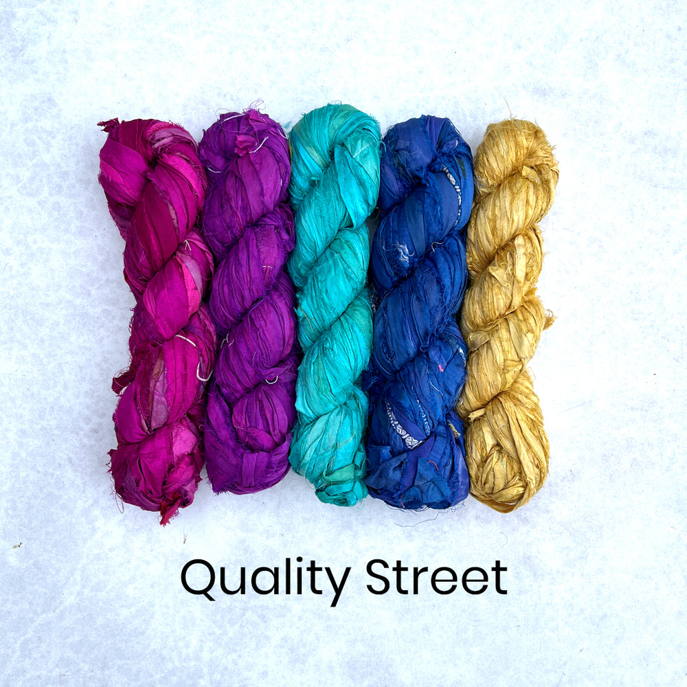 Colourful pack of recycled sari silk ribbon for rag rug making and all fibre crafts