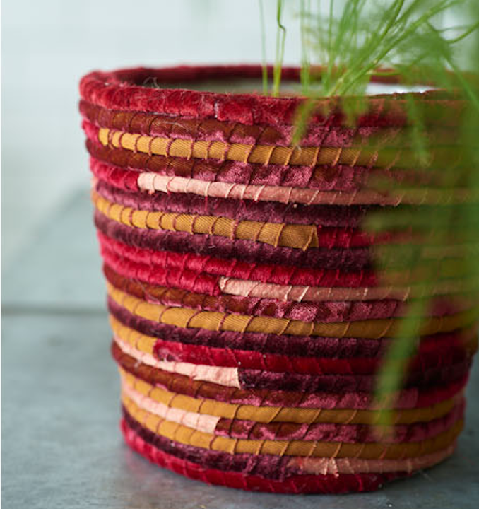 No-sew upcycled plant pot with red, orange and gold fabric-covered rope