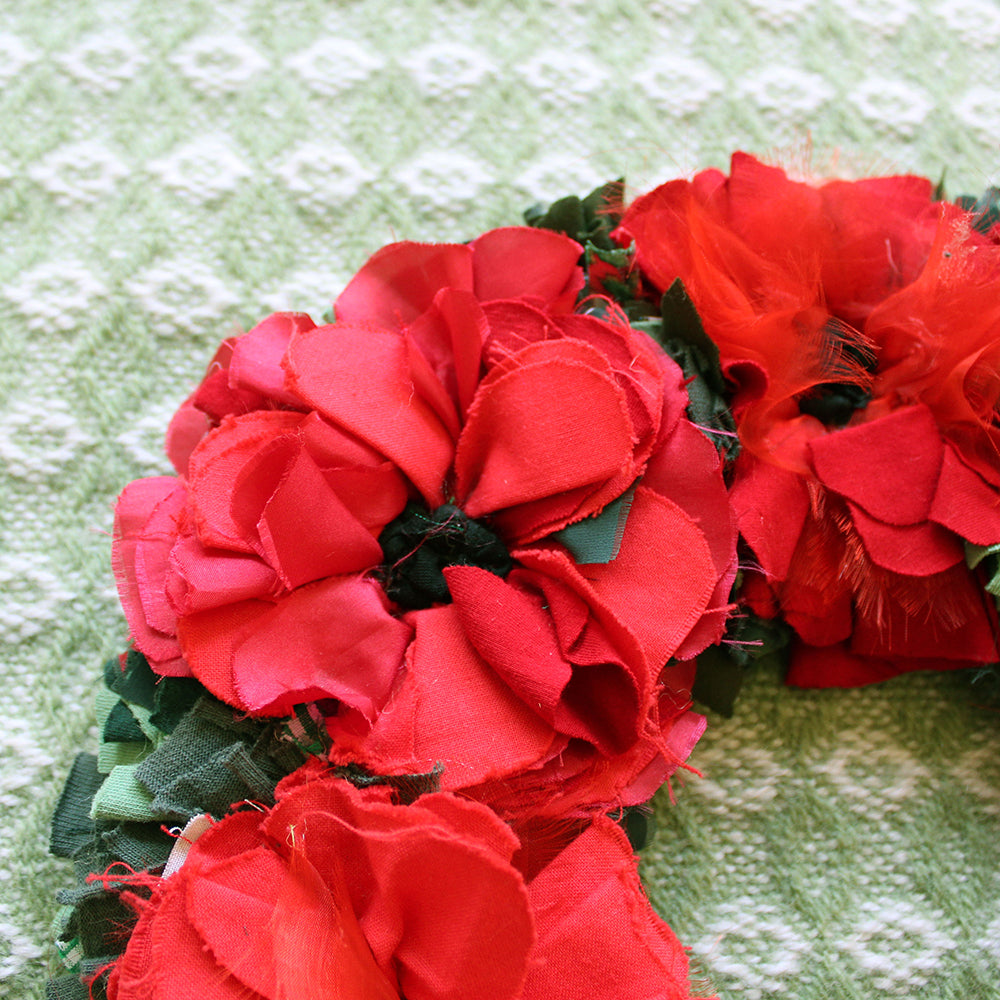 Edge of rag rug poppy wreath