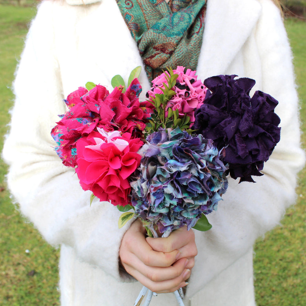 Rag rug flower bouquet in blue red pink and purple. Made using Ragged Life bouquet kit. 
