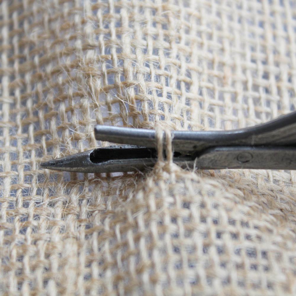How to use the rag rug spring tool to make rugs out of old clothing and rags