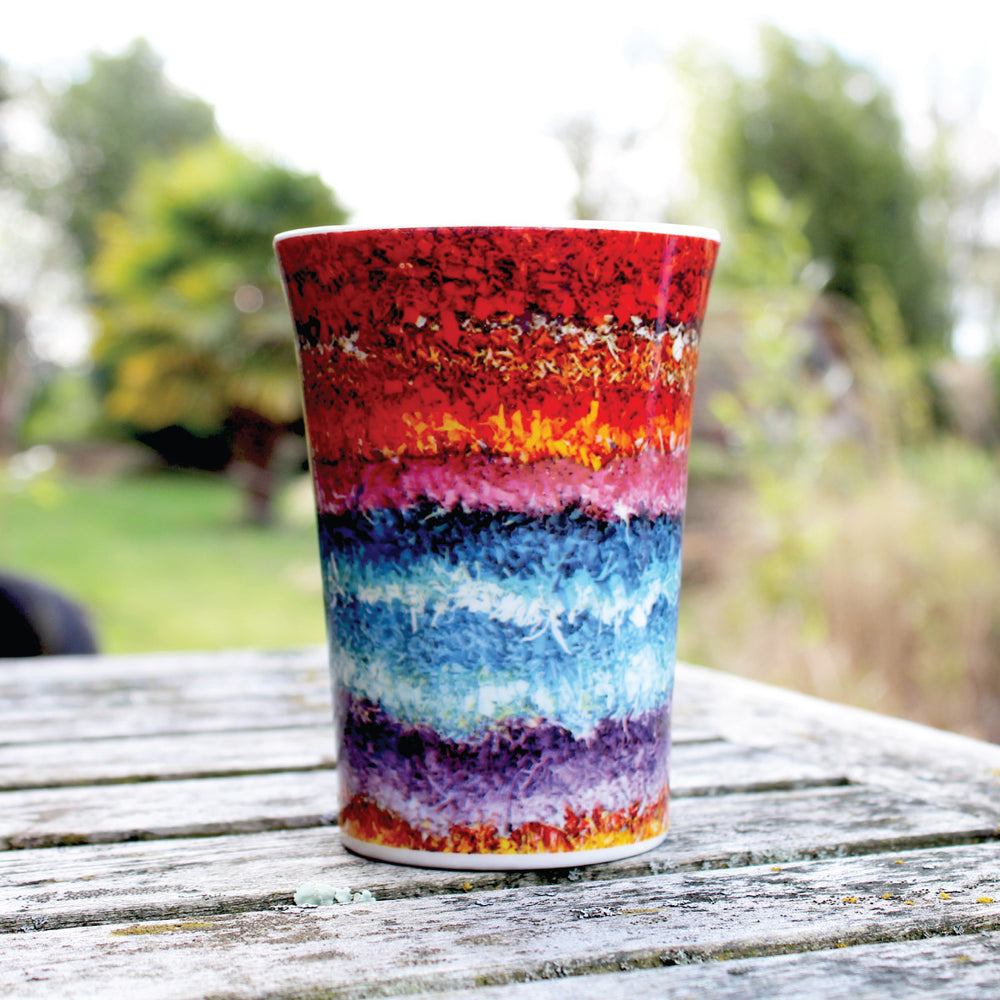 Ragged Life large mug with a rainbow stripe shaggy rag rug image